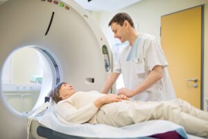 The differences between MRI and CT scans include the appearance of the equipment. CT scans are doughnut shaped, while MRI machines often are more enclosed.